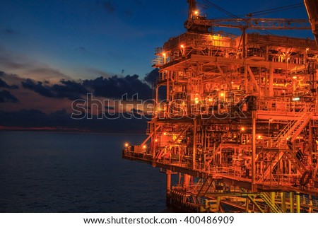 Offshore the night Industry oil and gas production petroleum pipeline.