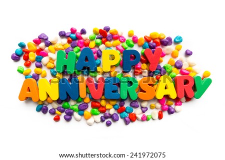 happy anniversary words in colorful stones