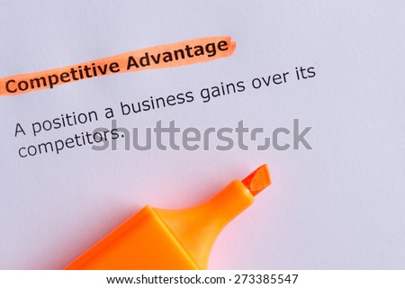competitive advantage word highlighted on the white paper