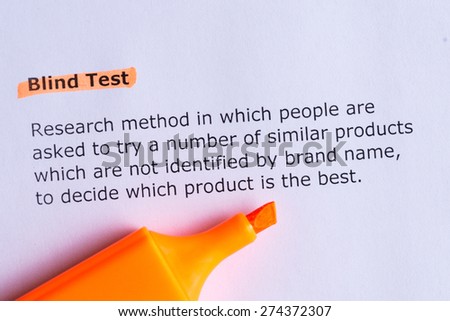 blind test word highlighted on the white paper