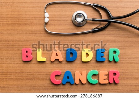 bladder cancer colorful word with stethoscope on wooden background