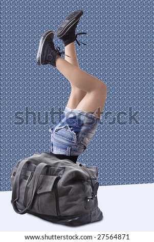 Conceptual picture. A young woman falling inside her bag.