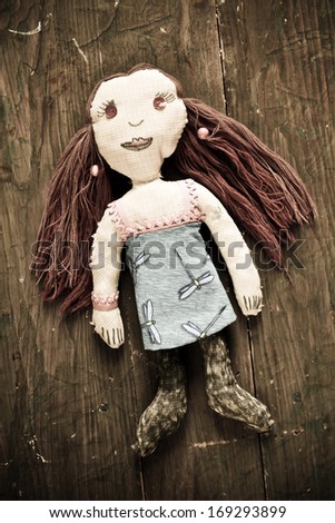 Hand made doll with red hair and a vintage look