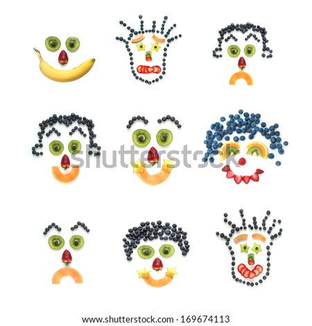 Happy and sad faces made with fresh fruits on white background