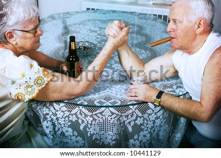 elderly couple Arm wrestling