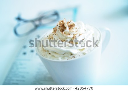 Hot chocolate with crossed words and glasses