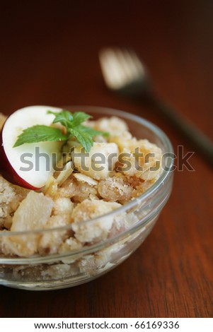 Fresh and home made apple crumble in clear containers
