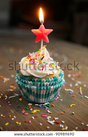 Birthday cupcake with a star candle on top