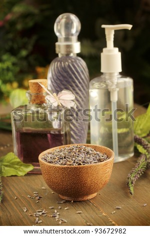 Lavender items, oil, cream, and dried lavender in background