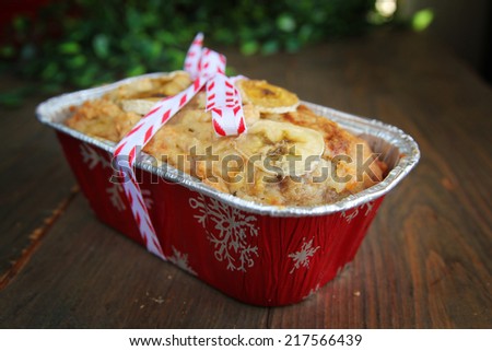 Banana bread with nuts in a christmas package
