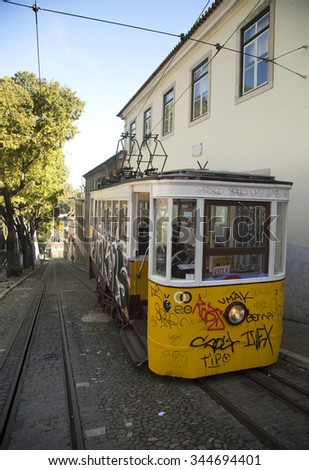 LISBON-PORTUGAL NOVEMBER 06, 2015:  In operation since 1873, The Lisbon tramway network serves the municipality of Lisbon, Portugal.  Yellow tramway are popular with the tourists.