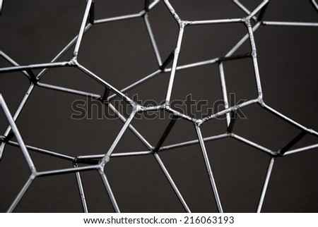 Connected Network of Welded Metal Pins resembling a Social Network