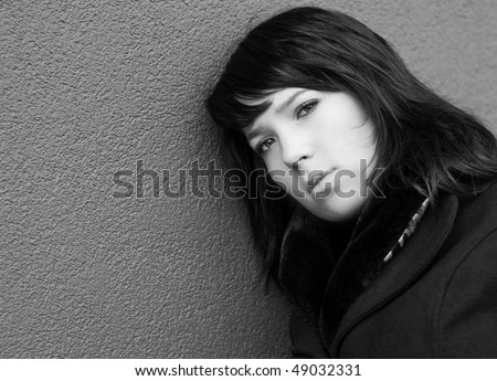 Portrait of woman with black hair in black and white