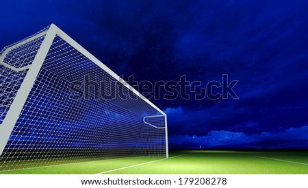 Soccer goal on the football field at night sky.