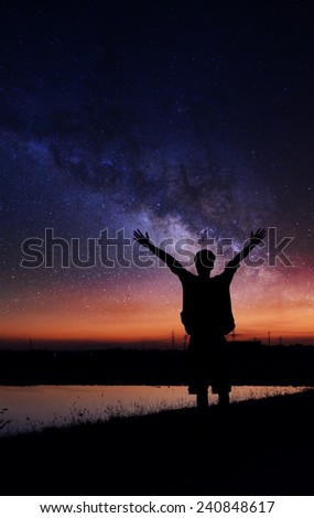 silhouette of shadow man with interstellar in the sky