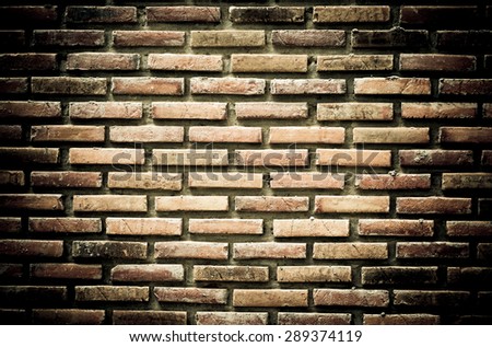 Texture of cement brick with dirty wall in construction house, vintage color tone