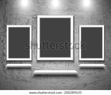 Three empty board in room with grunge walls