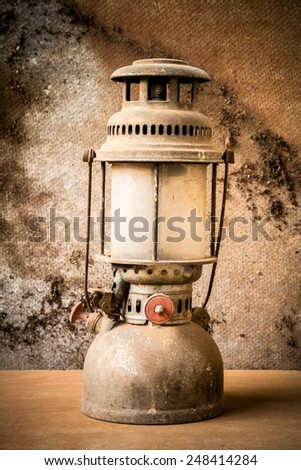 http://image.shutterstock.com/display_pic_with_logo/1854119/248414284/stock-photo-still-life-of-old-hurricane-lamp-248414284.jpg