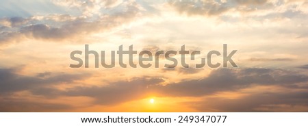 view of sky with clouds and sun in the morning