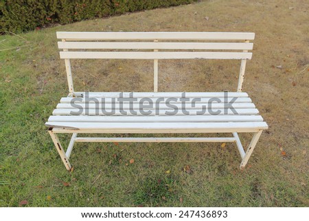 White metal benches in gardens