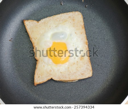 Image of egg in hole toast