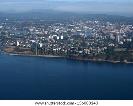 Victoria, British Columbia, aerial view from the south.  Beacon Hill Park is to the right.  The Inner Harbour & Parliament Building are in the center of the picture.