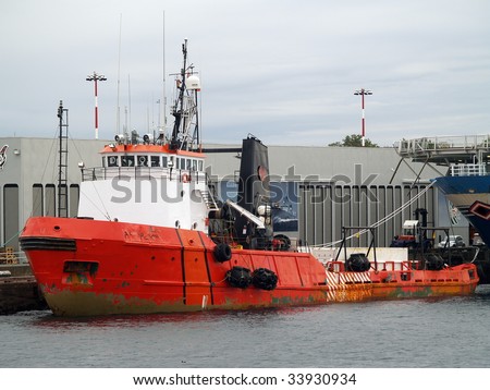 This 35 year old, 205 foot, 7200 HP Arctic Class II supply ship operates on Canada\'s three coasts, one of them seasonally. Built as Canmar Supplier.  Note the Inuktitut script writing on the bow.