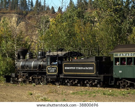 Classic steam locomotive makes its way through the North Saskatchewan River Valley at Fort Edmonton Park.  The EY&P Railroad went out of business over 100 years ago.
