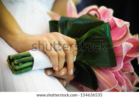 Marriage bouquet with a hand