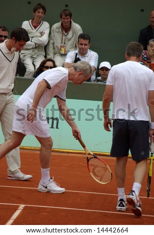 PARIS - JUNE 1: Retired tennis legend John McEnroe argue with the referee over a point while playing tennis at the Roland Garros Open on June 1, 2008 in Paris, France.