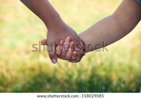 kids join hands