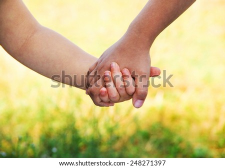 kids join hands