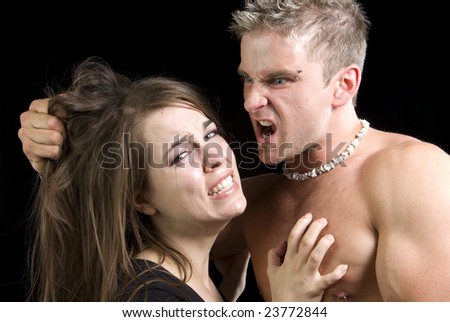 abusive violent man threatening his wife or girlfriend