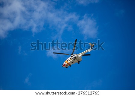 TURKU, FINLAND - MAY 09: Finnish ambulance helicopter in the sky. May 09, 2015 in Turku, Finland.