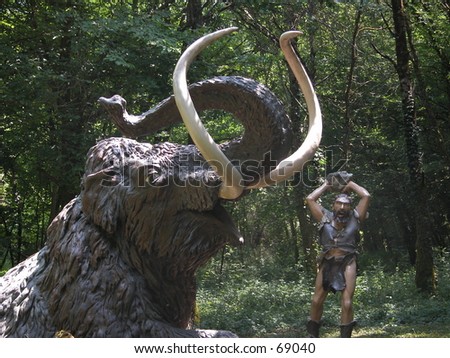 Cro magnon man  hunting a mammuth (models in a theme park)