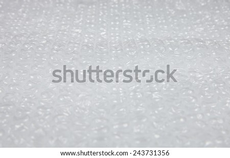 Plastic bubble wrap. Soft packing material. Safety fragile delivery.