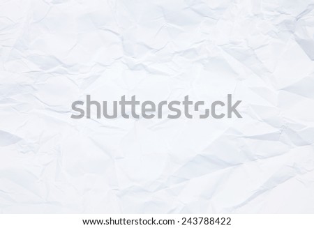 Paper texture. White crumpled paper sheet. Wrinkled creased page.