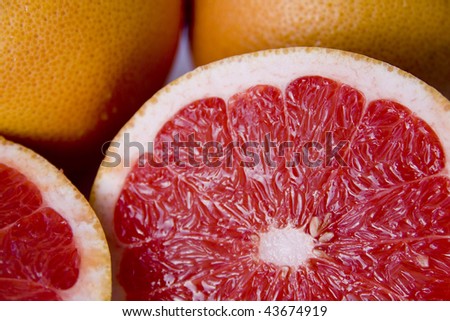 Ripe red grapefruit cut on slices