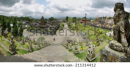 BALI, INDONESIA - SEPTEMBER 30: hinduism people taking offerings on September 30, 2009 in Besakih temple. This temple is known as mother temple and is the largest and most important in Bali, Indonesia