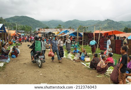 FLORES, INDONESIA-SEPTEMBER 22: people of minority ethnic group in the colorful market of Moni on September 22, 2009 in Moni, Flores, Indonesia.
