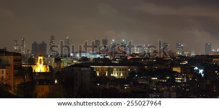 ISTANBUL, TURKEY - NOVEMBER 27:  Istanbul skyline of business buildings at night on November 27, 2014 in Istanbul, Turkey