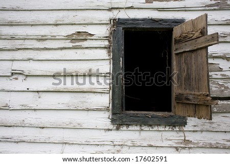 Rustic Cabin with window and shutter