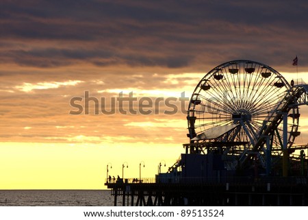 Santa Monica Ferris Wheel and Roller-coaster at Sunset