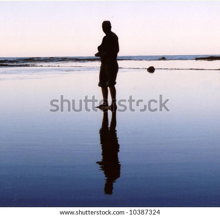 Reflection man 2, on beach