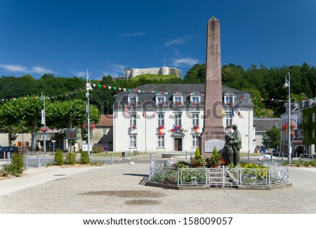 The central square of the French town Mauleon-licharre is photographed in summer.