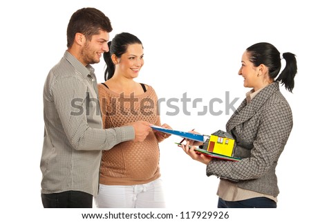 Real estate giving house contract to expectant couple isolated on white background