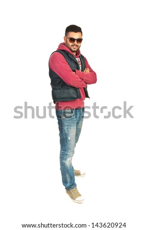 Full length of rapper man standing with arms folded isolated on white background