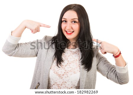 Happy woman pointing to her smile isolated on white background