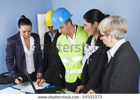 Architect team in office having a discussion at meeting and smiling together,an engineer man showing or design something on a paper