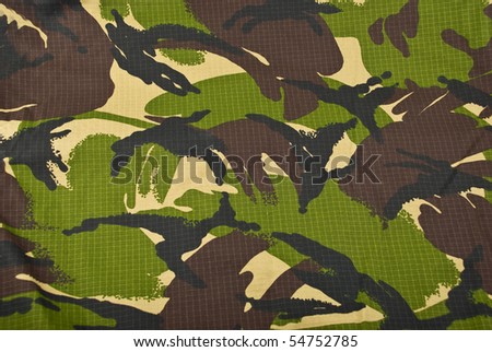 Combat camouflage cloth  in green and beige background